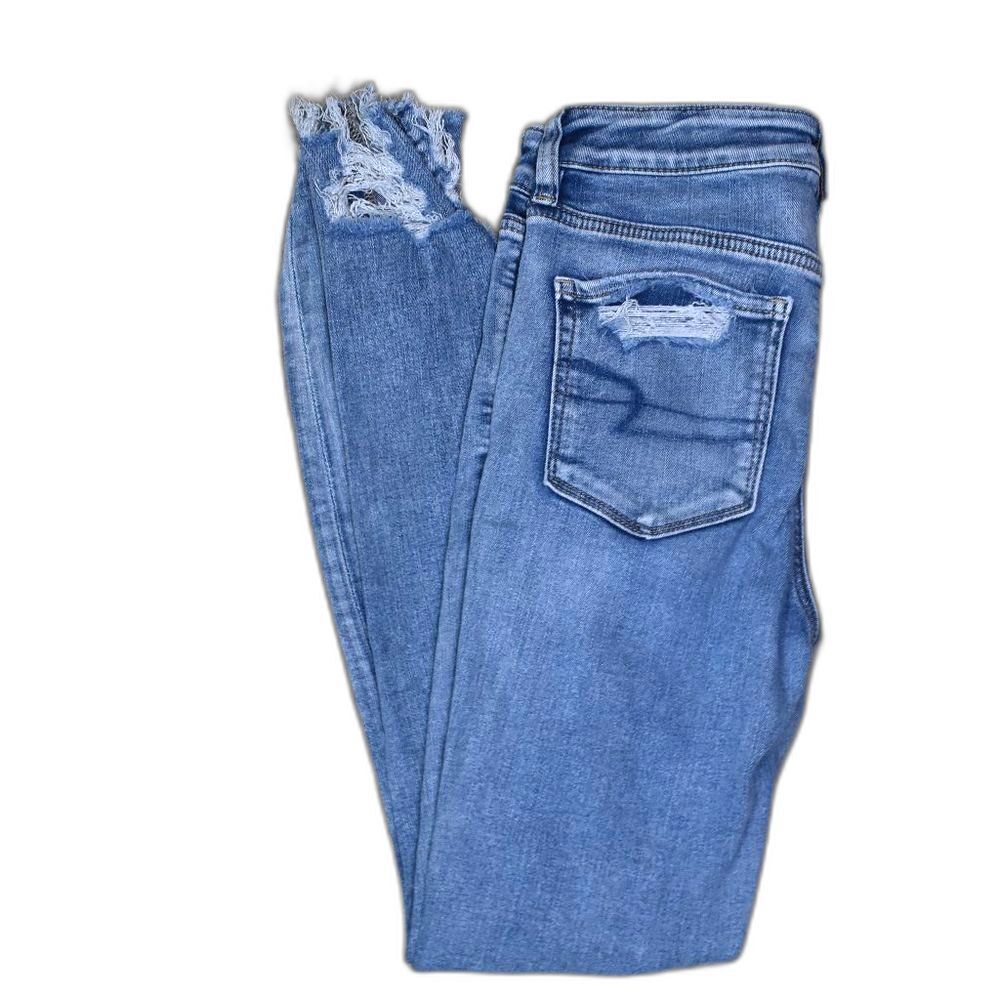 Distressed Blue Jeans